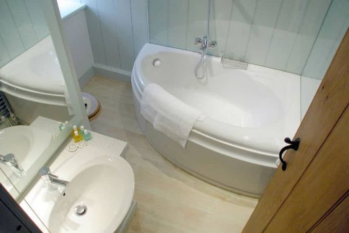 Family bathroom with bath and shower 