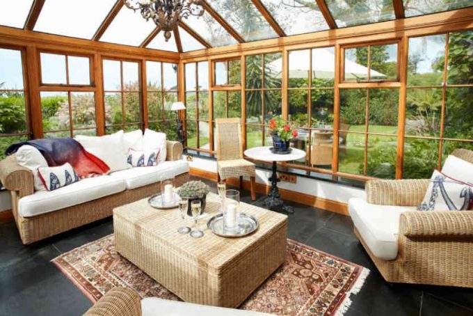 Large and spacious conservatory with doors outside